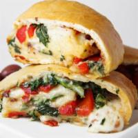 Veggie Roll · Served with onions, mushrooms, tomatoes and spinach.