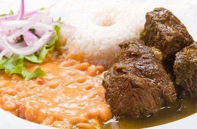 Seco Norteno · Beef slow cook in cilantro sauce served with rice pinto beans and onions sauce.
