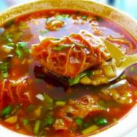 Menudo  · Traditional Mexican, beef tripe soup . 