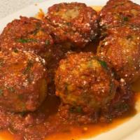 Meatballs  · Home-made meatballs made with beef and vile. Seasoned with home-made breadcrumbs with Romano...