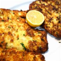 Chicken Cutlet · Large chicken cutlets breaded in house seasoned breadcrumbs and pan fried until golden brown...