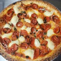 Pepperoni Pizza · Fior dI latte, San Marzano tomatoes, olive oil, and basil.
