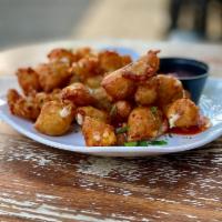 Fried Cheese Curds · Lightly breaded cheese curds, fried golden-brown made with mozzarella cheese and served with...