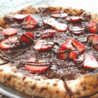 Nutella Pizza · Nutella on our pizza crust dusted with powdered sugar. Add strawberry for an additional char...