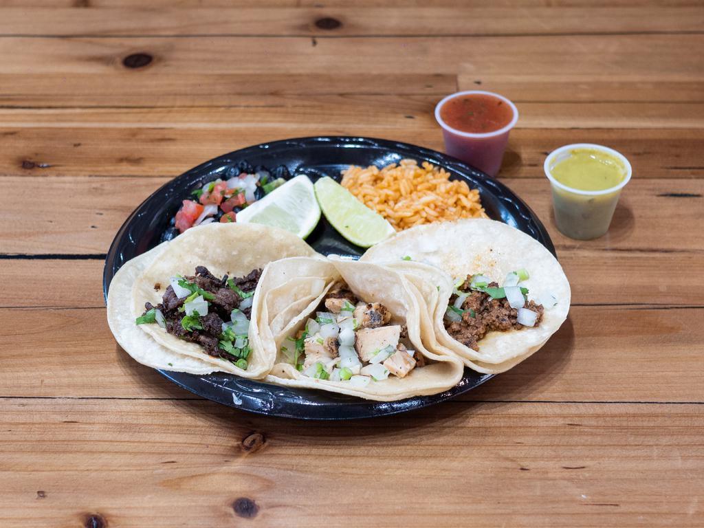 Loaded Taco Plate · 3 Loaded tacos with your choice of fillings  and 2 sides.