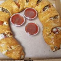 Any Large Calzone · Served with marinara dipping sauce.
you can add up to 8 toppings free of charge. 