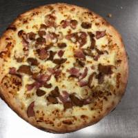 Cordon Bleu Pizza · Mozzarella and Swiss cheese with grilled or crispy chicken with ham and BBQ sauce.