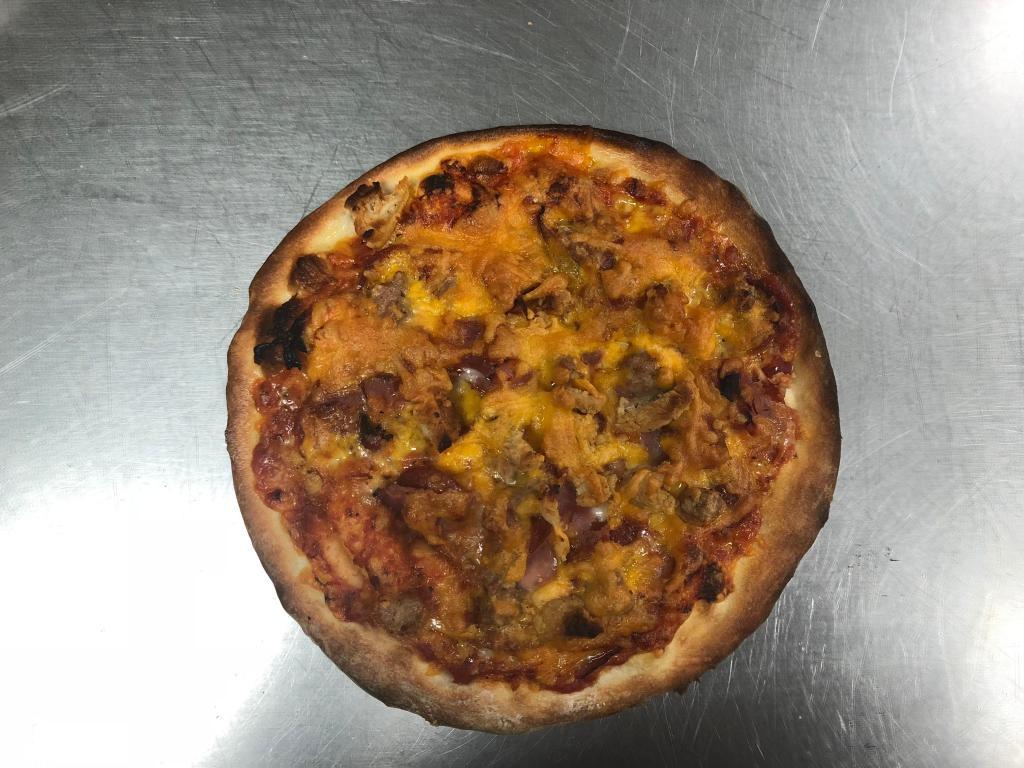 Meat eater · Pepperoni,ham,bacon,chicken ,sausage topped with cheddar
