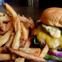 Waylon Burger · All-beef patty topped with cheddar cheese, lettuce, tomato, onion, pickles, and special sauc...