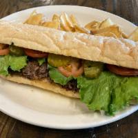 Roast Beef Po'Boy · Slow Cooked for 10 hours, this po'boy is the essential New Orleans delicacy.