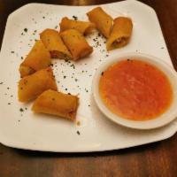 Vegetable Spring Rolls · crispy vegetable spring rolls with sweet chili dipping sauce 