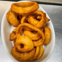 Onion Rings · Crispy beer battered onion rings served with ketchup 