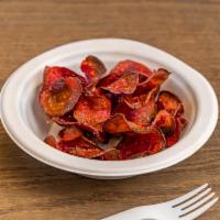 Beet Chips & Sea Salt · Fried beet chips with sea salt and carrot string topper.