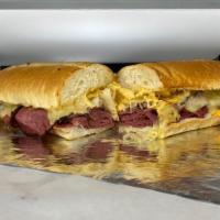 35. The Double Down Ruben Sub · Hot corned beef and pastrami with Swiss, sauerkraut Russian dressing, spicy mustard.