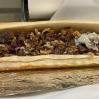 55. Exit 7A · Cheese steak, grilled peppers, onions, mushrooms, jalapenos with melted provolone cheese and...