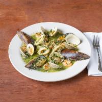 Mariscada in Green Sauce · Mixed shellfish cooked in a parsley, white wine, and garlic.