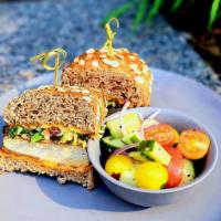 Crispy Sandwich · Toasted Sprouted oat Wheat Bun, breaded scallopini, power-blend coleslaw, Calabrian chili ai...
