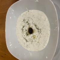 Cacik · Cacik. Greek yogurt with diced Kirby, touch of garlic, dry mint, dill, and olive oil.