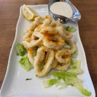 Fried Calamari · Served with chef's tarama sauce and fresh lemon.