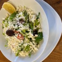 Mediterranean Salad · Akdeniz salatasi. Fresh tomatoes, lettuce, green peppers, kirby topped with feta cheese, oli...