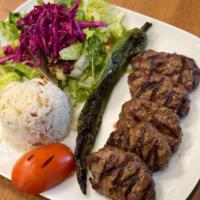 Kofte Kebab · Ground meat mixed with bread, onion, and garlic.