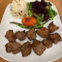 Lamb Shish Kebab · Lean cubes of lamb marinated and grilled over a charcoal fire.