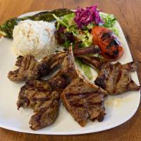 Lamb Chops · Large. Delectable lamb chops prepared in uniquely Turkish fashion over a charcoal flame.