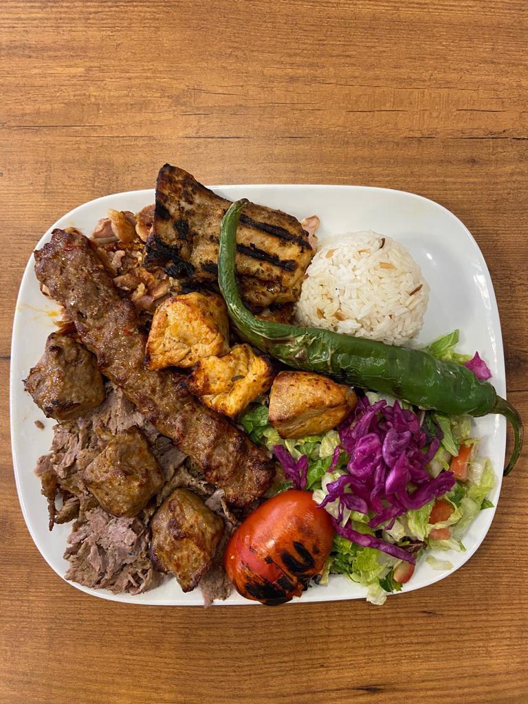 Mixed Grill · 4 different kebabs in 1 dish. An inviting combination of Shish kebab, Adana kebab, gyro kebab, chicken gyro, and chicken chops.