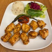 Chicken Shish Kebab · Tender chunks of chicken marinated with chef's own blend of herbs and spices.