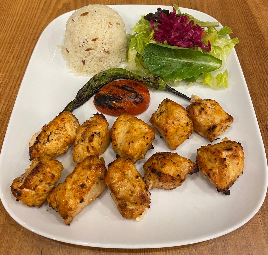 Chicken Shish Kebab · Tender chunks of chicken marinated with chef's own blend of herbs and spices.