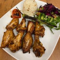 Chicken Wings to · Marinated chicken wings grilled to your taste.