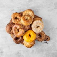 Baker's Dozen Bagels · Thirteen bagels. Hand-rolled, kettle-boiled and baked on premise. Please indicate the quanti...
