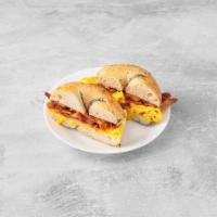 Mr. Bagel · Two eggs, grilled ham, bacon and cheese. Served with a bagel or toast. You are selecting a s...