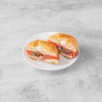 Eastern Nova Scotia Salmon Bagel Sandwich · With plain cream cheese, tomatoes, onions and capers.