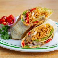 Grilled Steak Burrito · 12 Inch Tortilla with Peppers and Onions, Beans, Spanish Rice, Jack Cheese, Served with Sour...