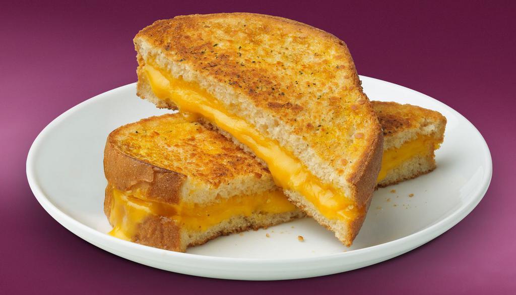 Kids Grilled Cheese · Kids grilled cheese on Texas toast with American cheese, french fries, apple slices and choice of drink.