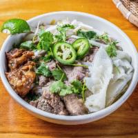 The Papa Pho · Rib Eye, Tripe, Beef Meat Ball & Beef Shin.

The Rib Eye packaged for take-out Pho's is serv...