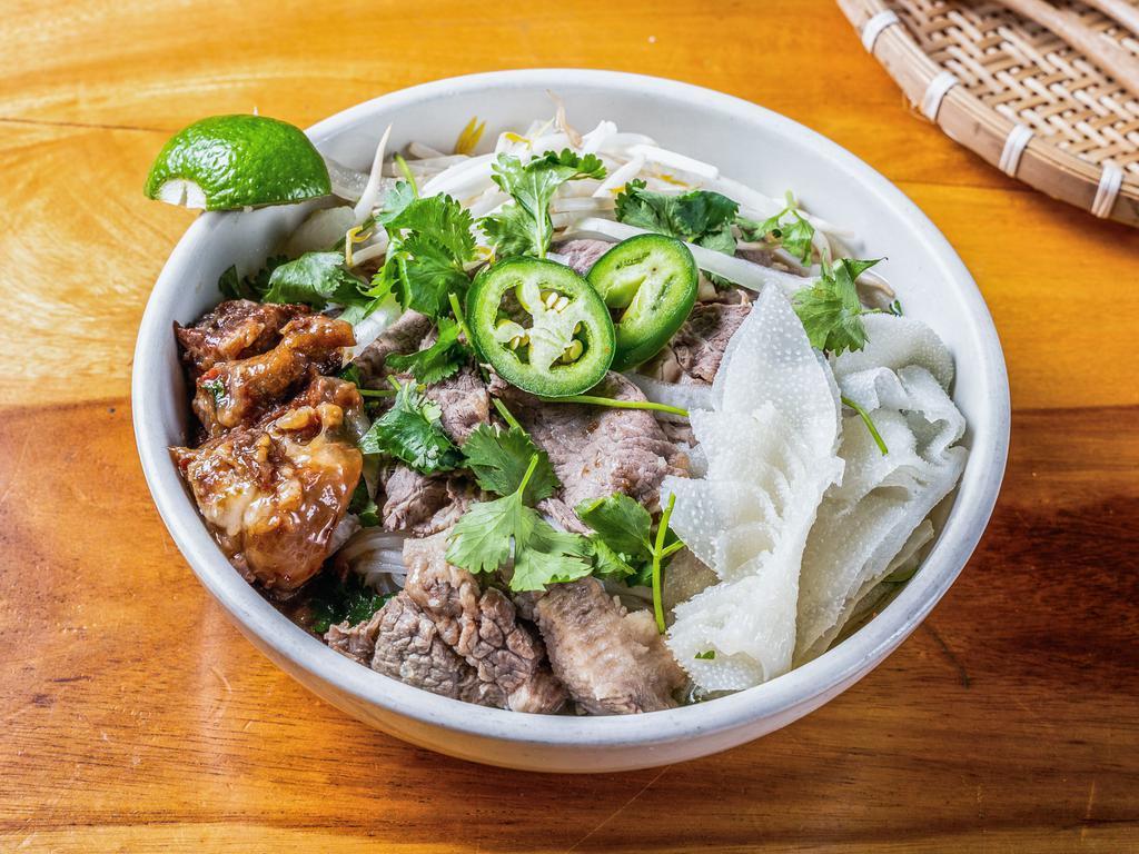 The Papa Pho · Rib Eye, Tripe, Beef Meat Ball & Beef Shin.

The Rib Eye packaged for take-out Pho's is served raw; the broth must be re-heated to 212F in order to cook the raw meat. Please let us know if you would like your meat to be pre-cooked.