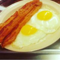 Meridian Express Breakfast · 2 eggs any style, choice of bacon or sausage and toast. Add cheese for an additional charge.
