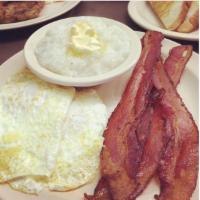 Meridian Sunrise Breakfast · 2 eggs any style, choice of bacon or sausage, hash browns or grits and toast. Add cheese for...