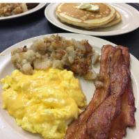 Meridian Full Load Breakfast · 2 eggs any style, choice of bacon or sausage, hash browns or grits, 2 pancakes and toast. Ad...