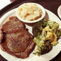 Grilled Ribeye Steak Dinner · Seasoned to perfection 6 oz. juicy ribeye served with mashed potatoes and steamed broccoli.