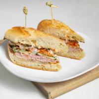 Banh Mi · Our homemade recipe of Vietnamese cured meats, pate, cucumbers, cilantro, pickled relish, ja...