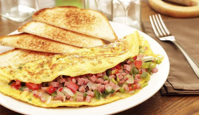 Western Omelette · Ham, onion, and bell pepper. Served with home fries and toast.