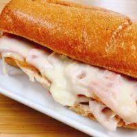 G3. Monte Cristo · Virginia ham, turkey, melted Swiss cheese & Cheddar cheese, lettuce, tomato, and honey musta...