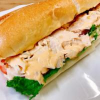 Chicken Breast Sandwich · Includes lettuce, tomato, and choice of dressing.