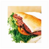 Pastrami Sandwich · Includes lettuce, tomato, and choice of dressing.