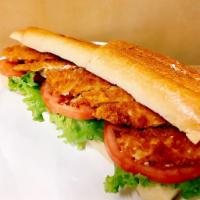 Breaded Chicken Cutlet Sandwich · Includes lettuce, tomato, and choice of dressing.