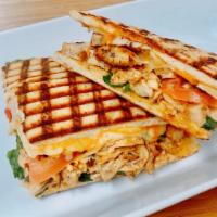 P7. California Panini · Grilled chicken, roasted pepper, tomato, lettuce, Pepper Jack cheese, and chipotle mayo on E...