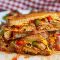 P10. Chicken Fajita Panini · Grilled chicken with salsa sauce, roasted pepper, caramelized onion, and Cheddar cheese on E...